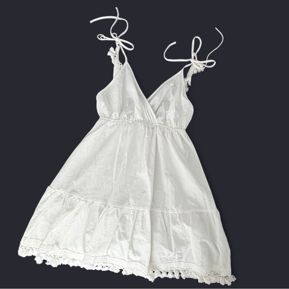White babydoll dress with tassels